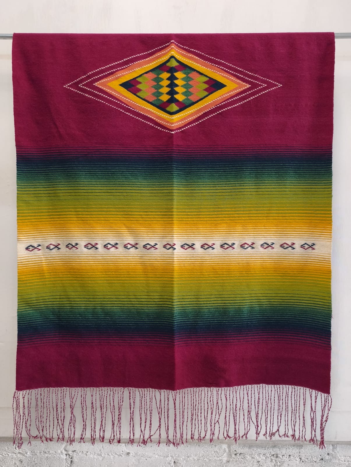 Chichiltik - award-winning rainbow ombre sarape with diamond medallion by Ignacio Netzahualcoyotl, 3rd Place Indian Market 2026