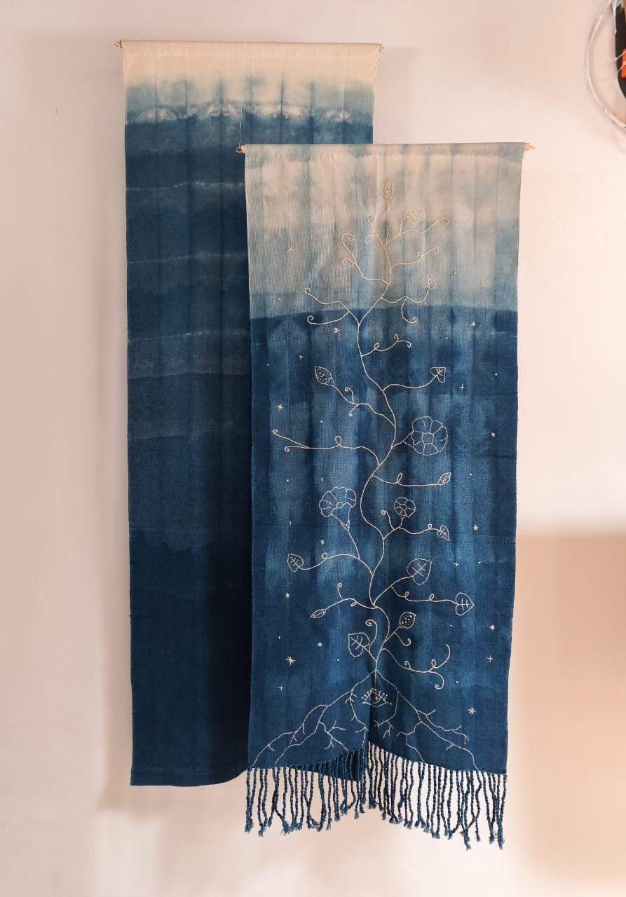 Ipomoea - indigo wool two-panel wall installation with hand-embroidered morning glory vines by Marlen Reyes Andrade, Taller Netzahualcoyotl