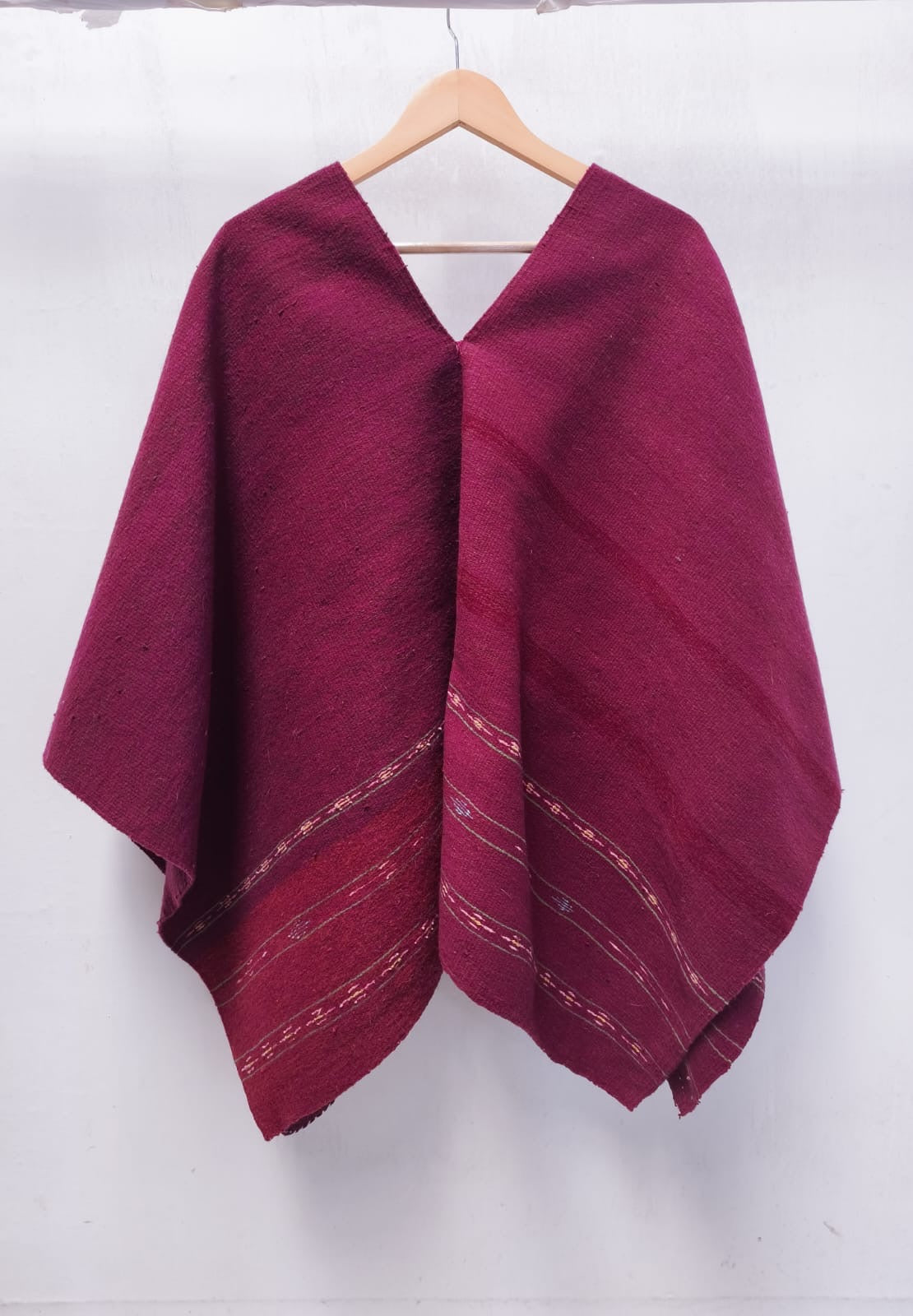 Amarantas - cochinilla-dyed maroon wool poncho by Taller Netzahualcoyotl, Indian Market 2026