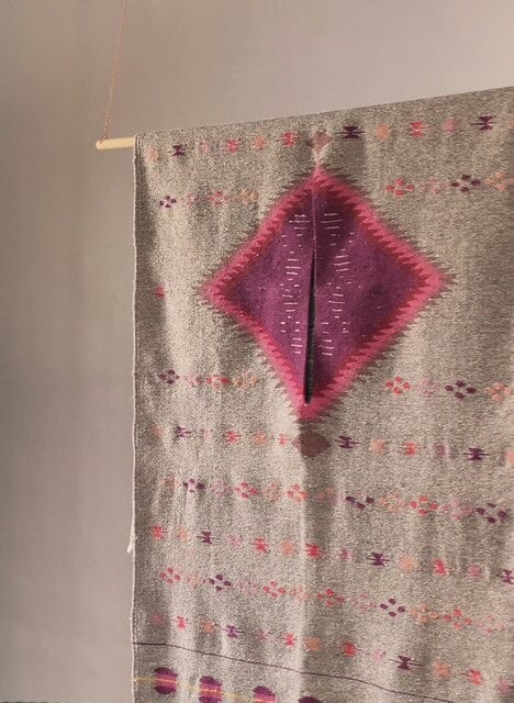 Flores y Mariposas - handwoven wall hanging with floral and butterfly motif and magenta diamond medallion by Cristiana Netzahualcoyotl, Indian Market 2026