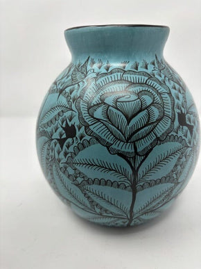 Huancito Pear Vase-Multiple Colors Home, Ceramics, Tabeltop, Gifts Espicio Family 7.5 inches tall by 5.5 inches wide 100% natural ceramic clay with burnished finish and hand painting French Blue with Black